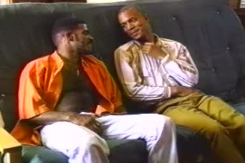 Two darksome boyz banging On The couch