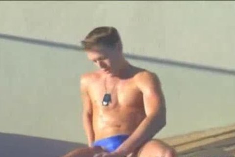 excited Blond Model In Speedos