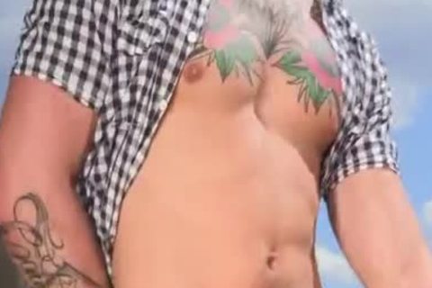 nasty Tattooed Hunk fuck In The Farm - gigantic