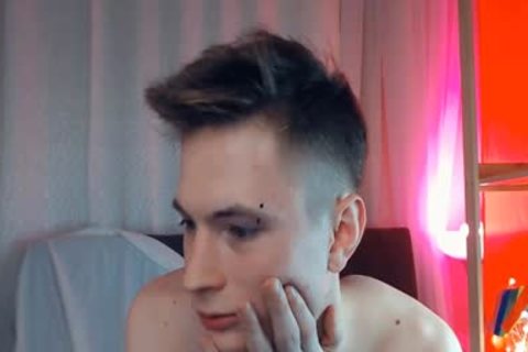 Blond Teenage boy With His Pale Skin stroking